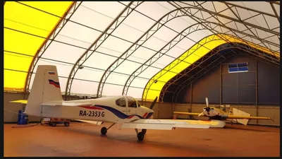 Ангар технического обслуживания самолета Стоковое Фото - изображение  насчитывающей обслуживание, средство: 59375274