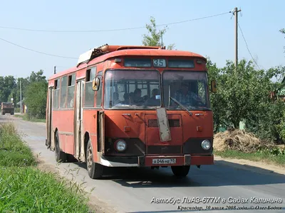 Купить масштабную модель автобуса ЛиАЗ-677М (красно-белый), масштаб 1:43  (СОВА)