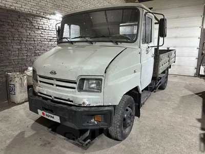 Купить масштабную модель грузовика ЗИЛ-5301 Бычок (зеленый/серый), масштаб  1:43 (Автоистория)
