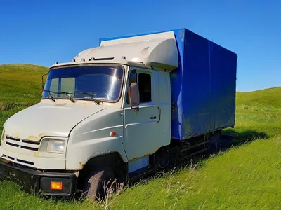 Купить масштабную модель грузовика ЗИЛ-5301 Бычок (зеленый/серый), масштаб  1:43 (Автоистория)