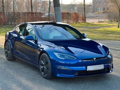 Tesla Model X фото и видео обзор автомобиля.