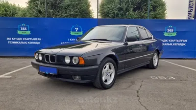 BMW M5 Sedan 1991 года выпуска для рынка Великобритании и Ирландии. Фото 1.  VERcity