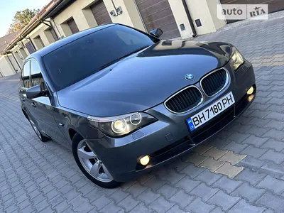 Car, BMW 525d Touring, model year 2005-, dark blue, upper middle-sized ,  hatchback, driving, diagonal from the front, frontal vi Stock Photo - Alamy