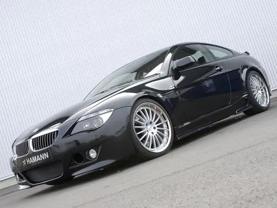 A highly customized and lowered bmw 645 ci with a widebody kit on Craiyon