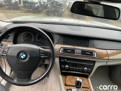Фото отчет по перетяжке кожей BMW 7 серии
