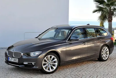 Так выглядит новейшая BMW 5-series в кузове универсал. Живые фото новинки,  лишь частично прикрытой камуфляжем
