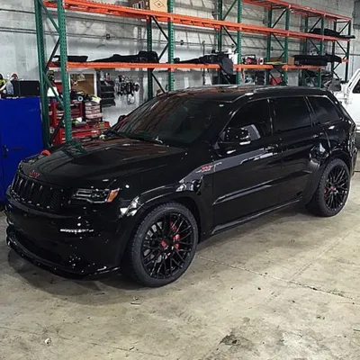 Black jeep grand cherokee with custom modifications on Craiyon