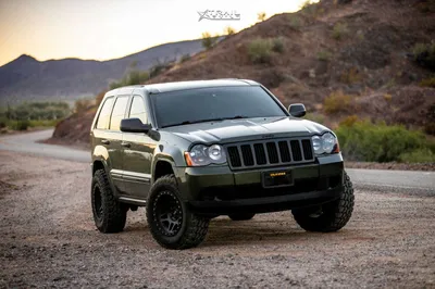 2008 Jeep Grand Cherokee with 17x9 -12 XD Addict and 285/70R17 Goodyear  Wrangler Duratrac and Suspension Lift 3.5\" | Custom Offsets