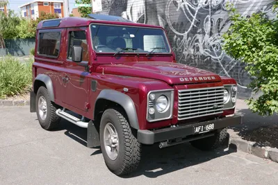 CLASH OF THE CLASSICS: LAND ROVER DEFENDER VS JEEP WRANGLER — Classic Cars  For Sale