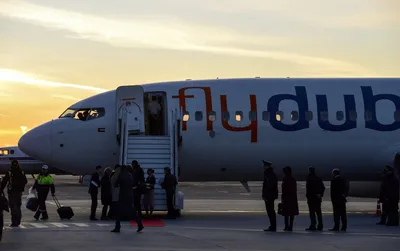 Самолет Fly Dubai Приземлился В Аэропорту Flydubai Является Низкобюджетной  Авиакомпанией — стоковые фотографии и другие картинки Авиакосмическая  промышленность - iStock