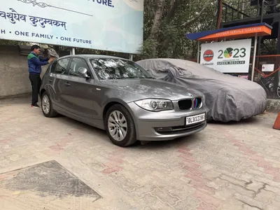 Car, BMW 116i, model year 2005-, dunkelblue moving, diagonal from the  front, frontal view, country road, photographer: Rossen Ga Stock Photo -  Alamy