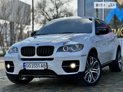 БМВ Х6 (BMW X6) белого цвета.