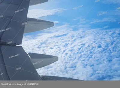 Крыло самолета, летящего над облаками с закатным небом. Вид из окна самолета.,  Stock Footage Включая: антенна и красивая - Envato Elements