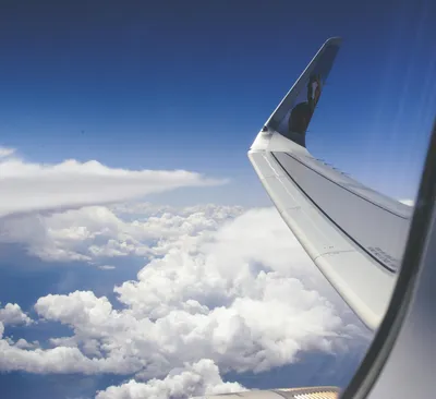 Вид на облака с окна самолёта …» — создано в Шедевруме
