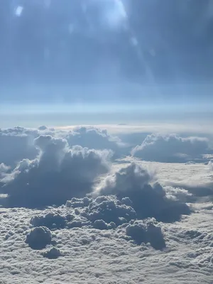 Небо, облака, внутри облаков самолет» — создано в Шедевруме