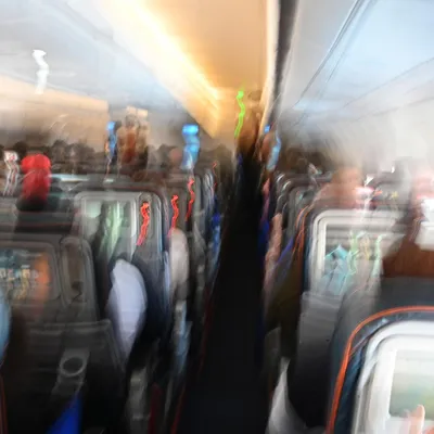 Пассажиры внутри самолета стоковое фото. изображение насчитывающей тип -  130461352