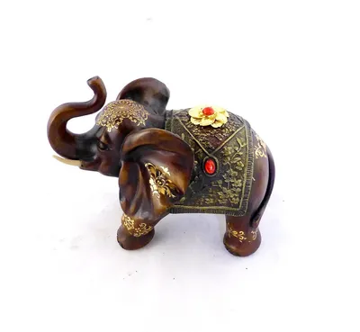 Слон игрушки индийский с поднятым хоботом Стоковое Изображение -  изображение насчитывающей символ, хобот: 146209807