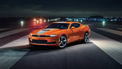 оранжевый гоночный автомобиль стоит в прохладном темном гараже, картинка  гоночной машины, автомобиль, гонка фон картинки и Фото для бесплатной  загрузки
