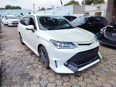 Toyota Corolla Axio, Fielder: Japan-only hybrid duo launched - Drive