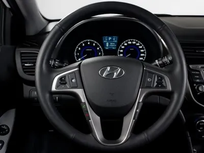 Hyundai Solaris Hatchback 1.6 бензиновый 2012 | Красный гранат на DRIVE2