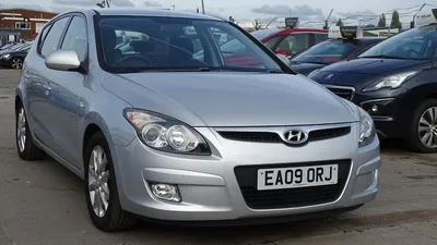 Hyundai i30 SW 1.6 CRDi - MY 2009 - grey - Korean popular compact station  wagon, segment C - on parking space Stock Photo - Alamy