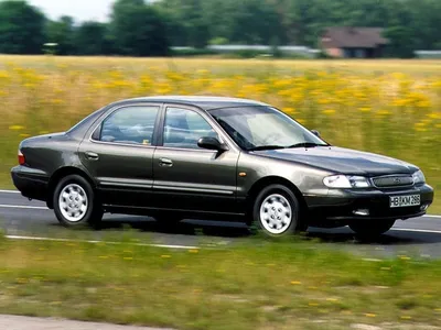 Характеристики и фото Kia Clarus 1 поколение 1996 - 1998, Седан