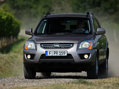 File:Kia Sportage JE Modelljahr 2009 EX 2WD Gomeragrau.JPG - Wikimedia  Commons