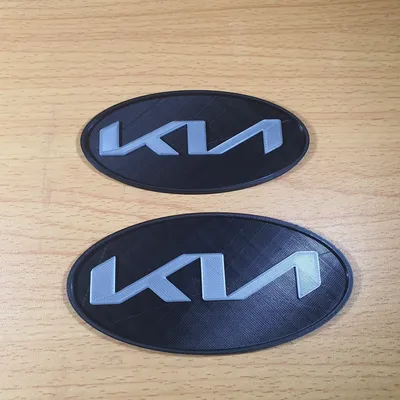 Эмблема (значок) Kia Sportage (2016-Н.в.) передняя