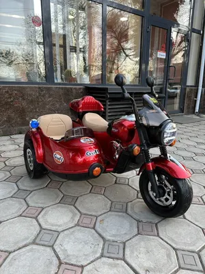 Красный мотоцикл на фотографии с iOS