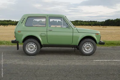 Blue Russian Off-road Car Lada Niva 4x4 VAZ 2121 / 21214 Parked on the Snow  Field. Editorial Stock Image - Image of december, lada: 135254629