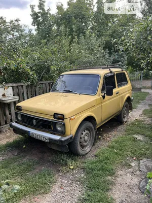 Black Russian Off-road Car Lada Niva 4x4 VAZ 2121 / 21214 Parked on the  Field. Editorial Image - Image of lada, motor: 145880435
