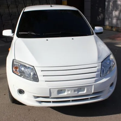 Купить масштабную модель автомобиля LADA Granta Lux 2015 (ВАЗ-2190) белое  облако, масштаб 1:43 (DiP Models)