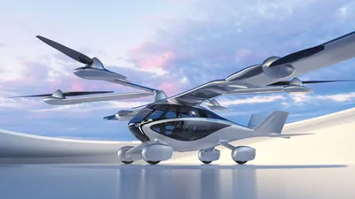 В Японии изобрели беспилотный летающий автомобиль. Создатель — компания NEC  Corp. Машина представляет собой дрон на колесах с четырьмя пропеллерами, ее  длина и ширина — около 4 м, высота — 1,3 м,