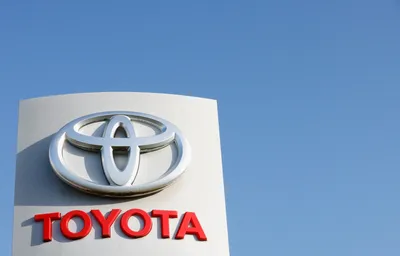 Toyota logo brand car symbol with name white Vector Image