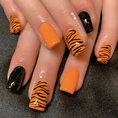 Tigger nails | Tiger nails, Tiger stripe nails, Football nail designs