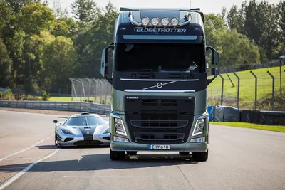 Volvo FH 12.460 6x4 | грузовик с откидными бортами - TrucksNL