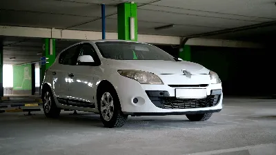 Renault Megane III Coupe 2.0 TCE - MY 2009 - black metallic - two doors  (2D) - French compact coupe - on a car park Stock Photo - Alamy