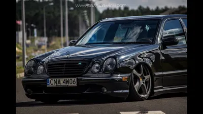 2 guys with mercedes w210 on Craiyon