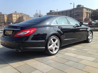 Car, Mercedes CLS 350, model year 2004-, silver, Limousine, driving,  diagonal from the back, rear view, country road, photograph Stock Photo -  Alamy