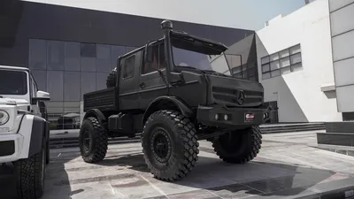 The Mercedes Unimog. The person is 6' 4”. You do not need a CDL to drive  this. : r/AbsoluteUnits