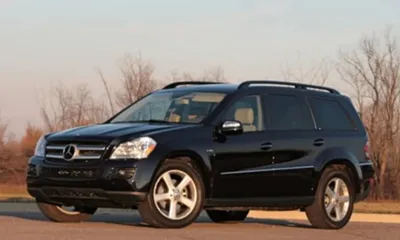 Mercedes GL 320 CDI, model year 2006-, black, driving, diagonal from the  front, frontal view, country road Stock Photo - Alamy