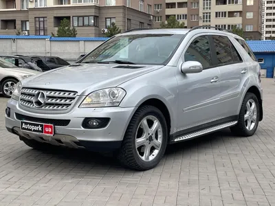 Car, Mercedes ML 320 CDI, model year 2005-, silver, cross country vehicle,  driving, diagonal from the back, rear view, photograp Stock Photo - Alamy