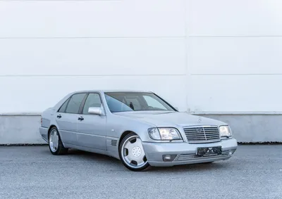 A mercedes benz w140 with lowered suspesion and a widebody kit on Craiyon