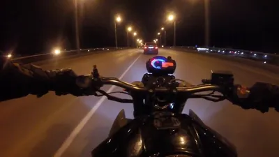 Фотография На мотоцикле ночью на мотивационном постере
