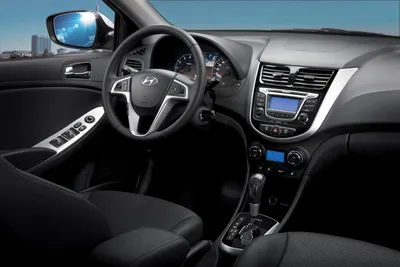 Интерьер салона Hyundai Solaris Hatchback (2011-2014). Фото салона Hyundai  Solaris Hatchback