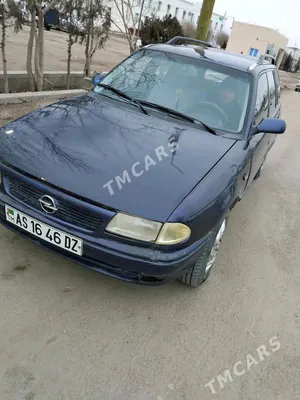 Black opel astra 1996 with blue windows on Craiyon