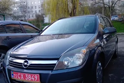 Серый Opel Astra 2006 года с пробегом по цене 375 000 руб. в Новосибирске