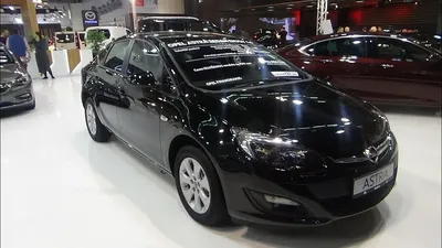 Opel Astra 1.9 CDTi Twin Top Edition, model year 2007-, black, driving,  diagonal from the back, side view, country road, open to Stock Photo - Alamy