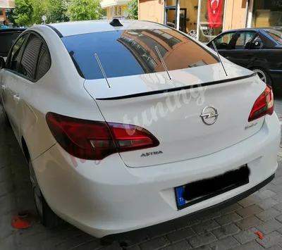 Фото отчет по перетяжке кожей Opel Astra J (Опель Астра)