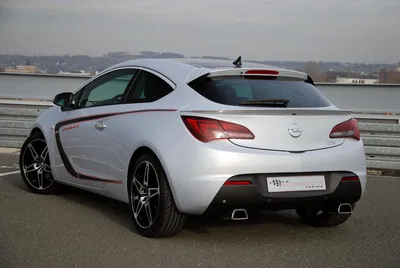 Opel astra gtc grey logo with crown on top on Craiyon